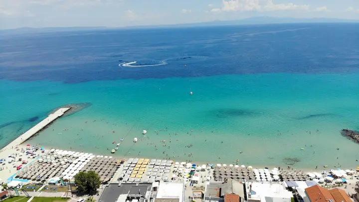 North Kallithea Chalkidiki beach with turquoise waters — 8 minutes from Anastasia Eleni